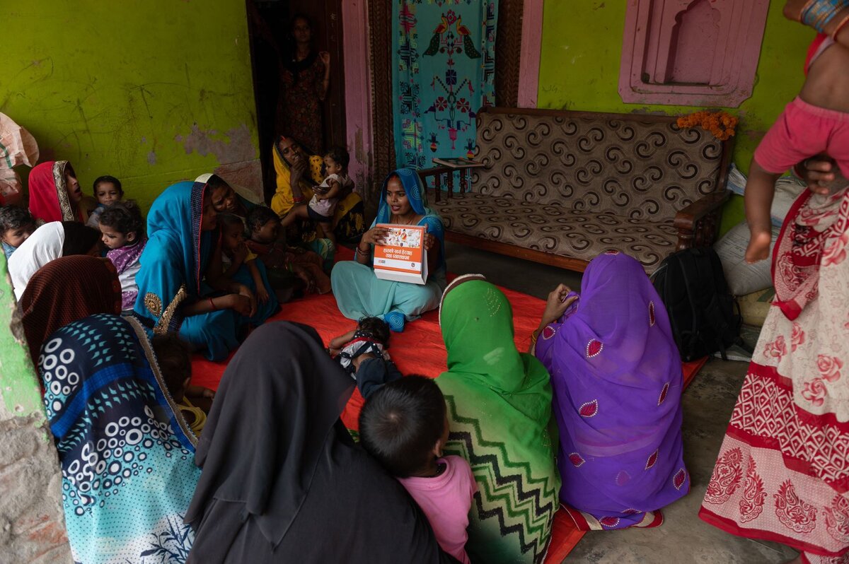 A trained community health volunteer, disseminating NTD messages to the mother group. Photo: &copy; FAIRMED<br>