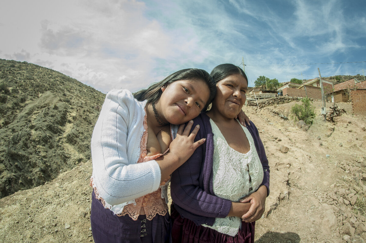 Sabina Colque Espiritu, a 18 year old young mother of a newborn and her mother Leandra. After she participated in the Wawaspaq program she has an affectionate relationship with her mother Leandra who supported her during and after the pregnancy, Sucre, Bolivia. Photo: &copy; CBM<br>