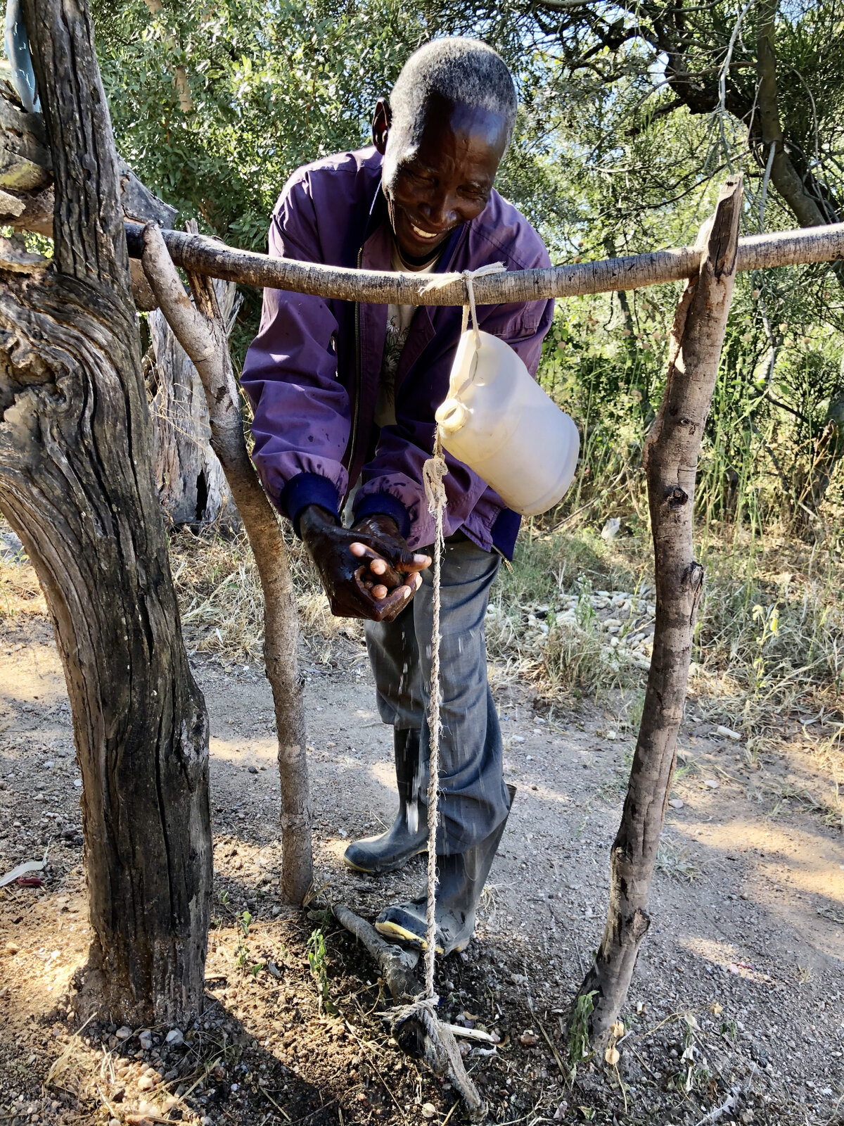 CHW demonstrating hand washing. Photo: &copy; OCA<br>