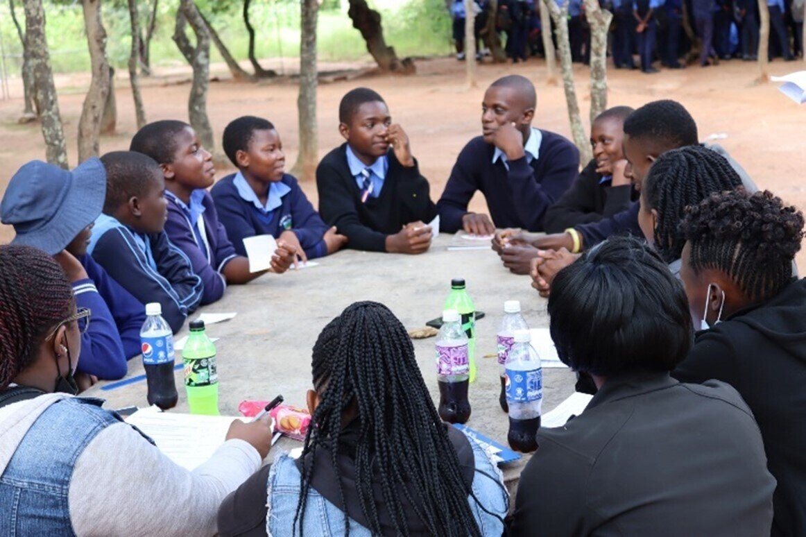 Adolescents discuss issues during a FGD of the baseline survey, March 2023. Similar meetings take place monthly in the supported communities where adolescents discuss future interventions. Photo: &copy; Rudo Mandabva